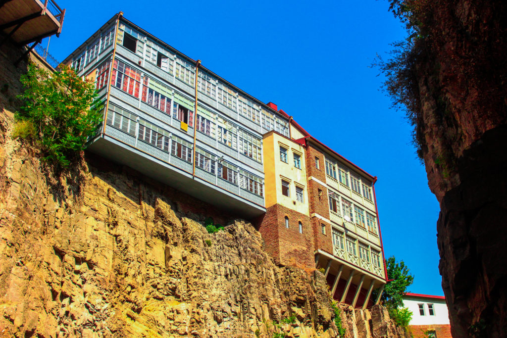 A building hanging off the cliff