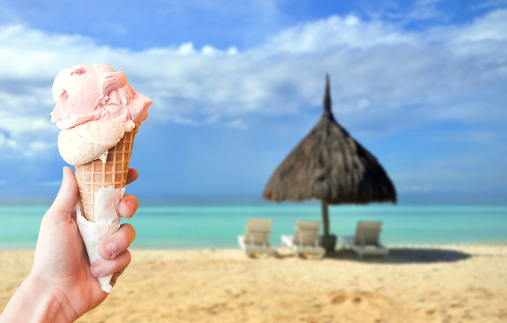 A picture of an ice cream by the sea